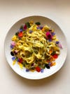 bowl of pasta with flowers