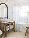 Bathroom with wooden sink console