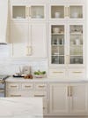 cream colored kitchen and glass front doors