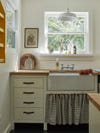 rustic kitchen with skirted sink