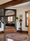 black painted arch in an entryway