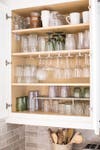 cabinet with organized glassware