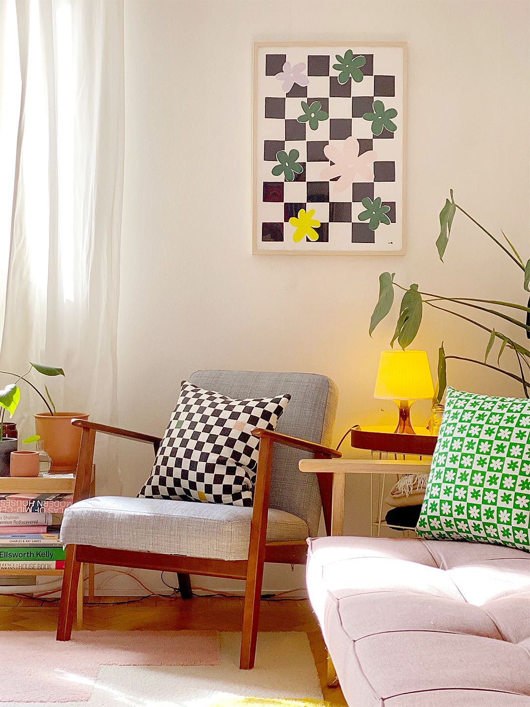 Corner of colorful living room with assorted prints
