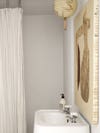 white bathroom with textured white walls