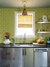 Green tiled stainless steel kitchen