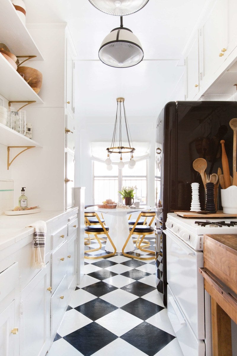 galley kitchen with checkered floors