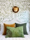 Kids room with leafy wallpaper