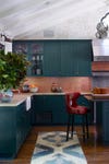 teal kitchen cabinets copper backsplash