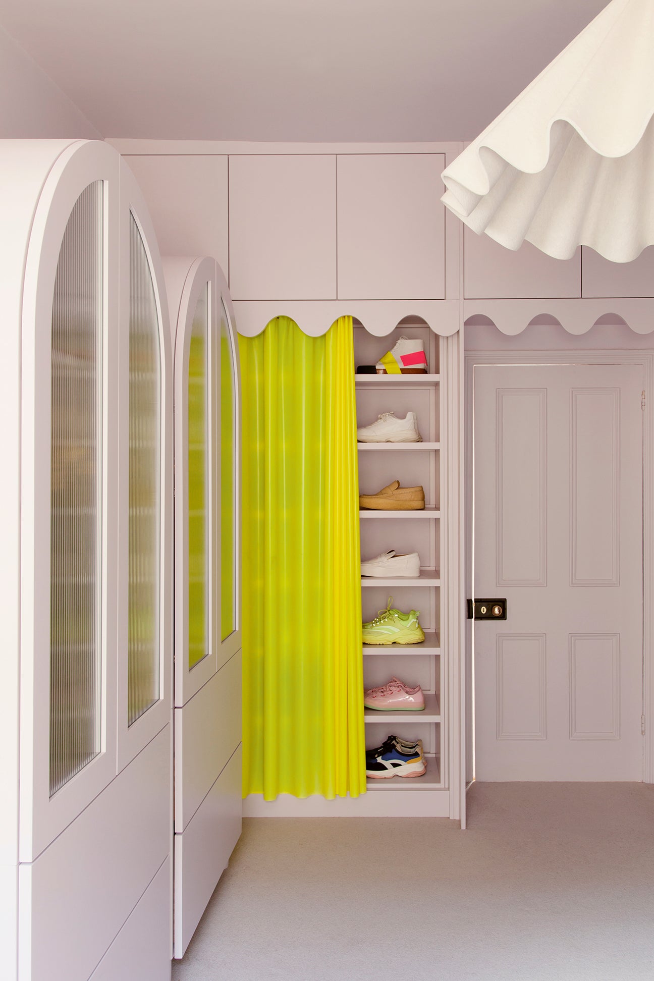shoe storage with neon yellow curtain