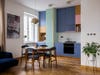 color-blocked kitchen cabinets and dining table