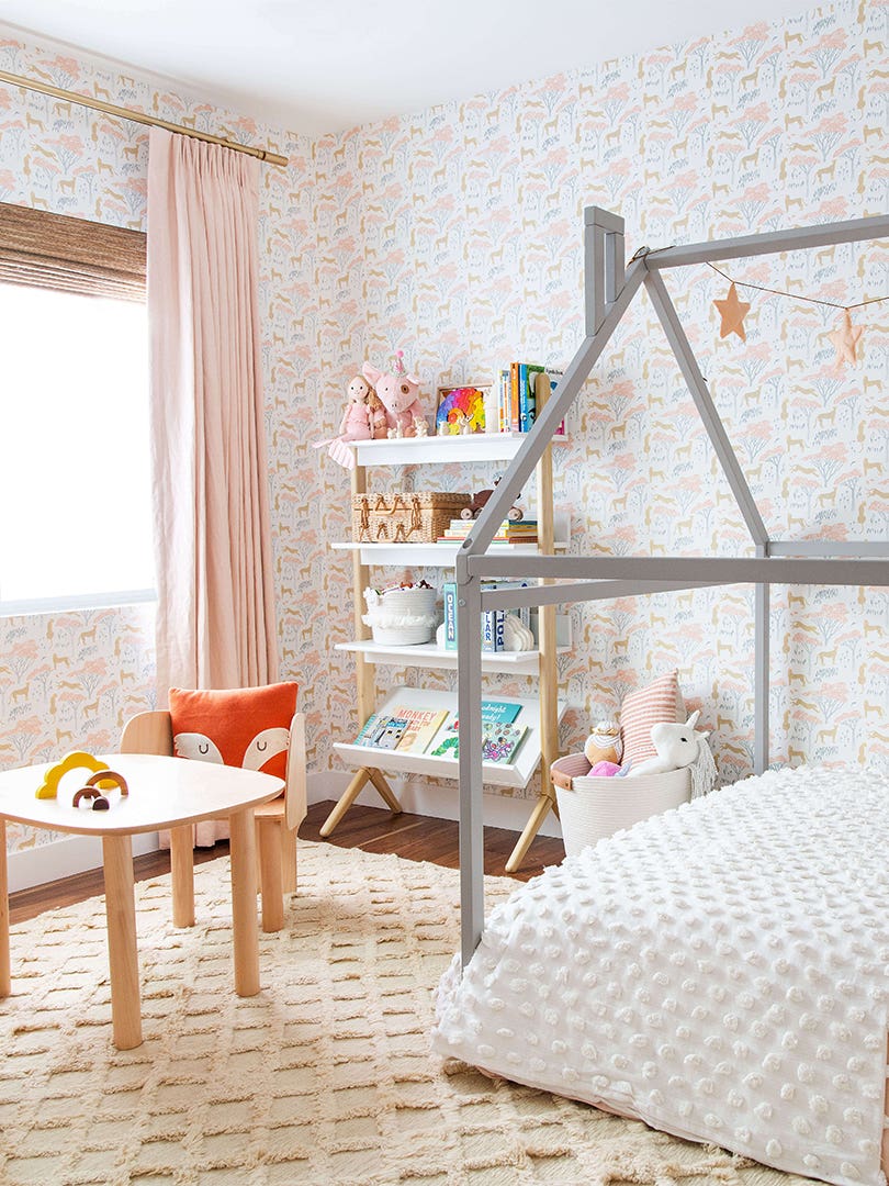 Kids room with house-shaped bed and Hygge & West wallpaper