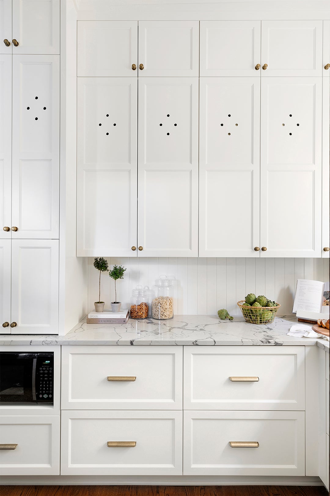 Traditional kitchen with white cabinets