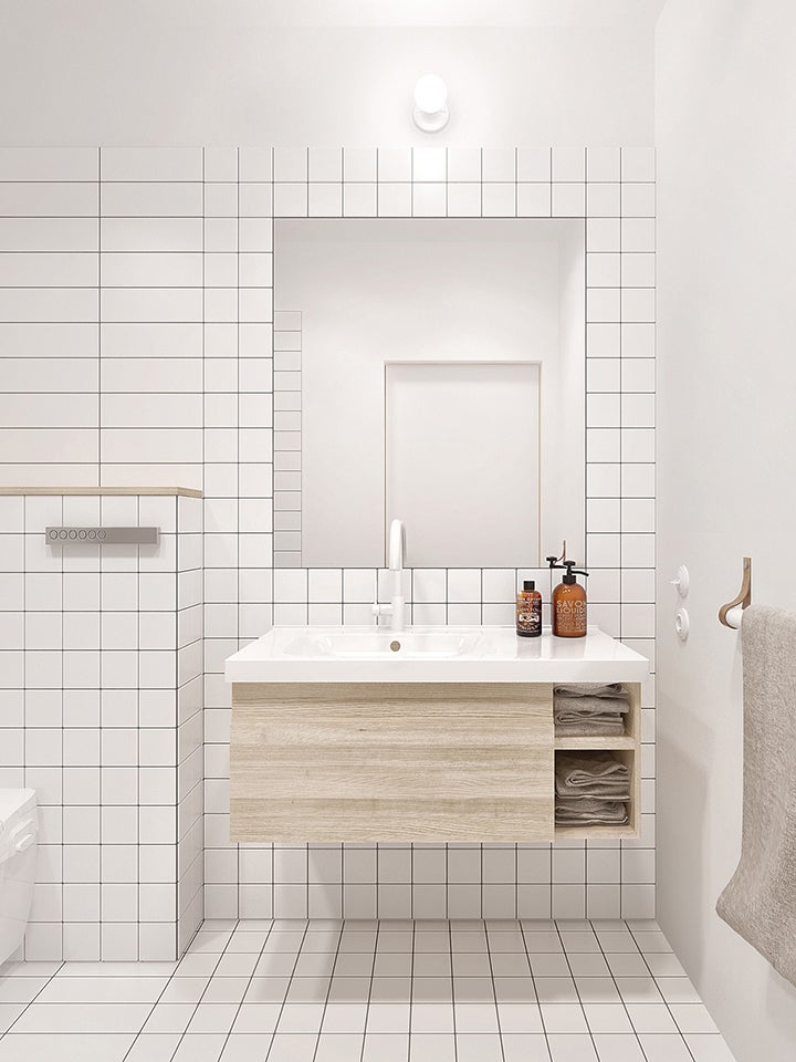 white grid bathroom tile and wooden sink