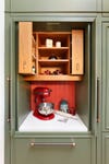 Baking station with red and green cabinets