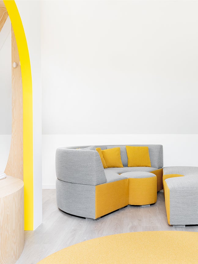 round gray and yellow sofa
