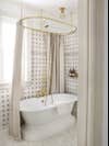 shower nook with tiled bathtub