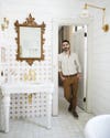 Anthony d'argenzio in tiled bathroom