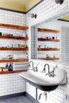 industrial bathroom wooden floating shelves farmhouse sink