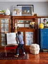 Boy painting on easel