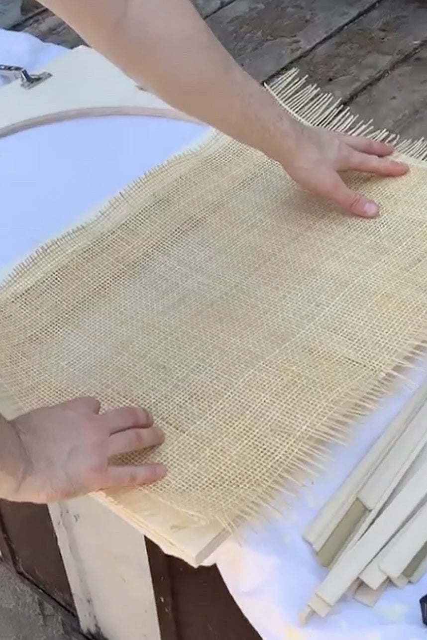 cane webbing being stretched