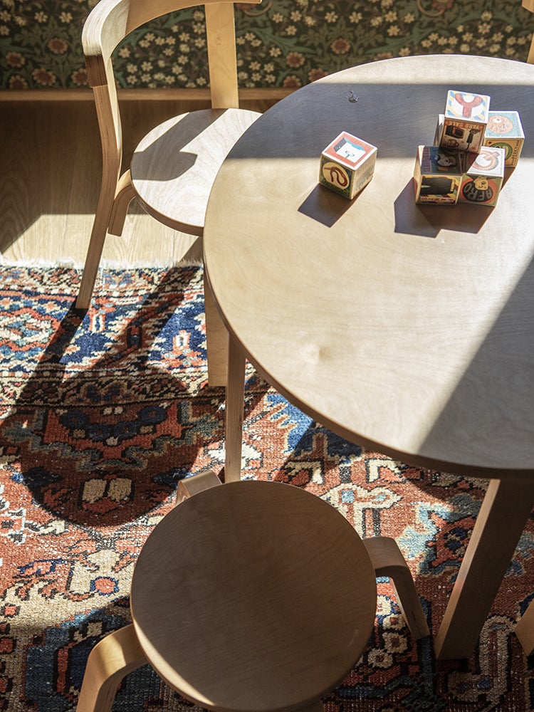 Kids play table above a Turkish rug