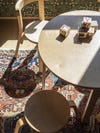 Kids play table above a Turkish rug