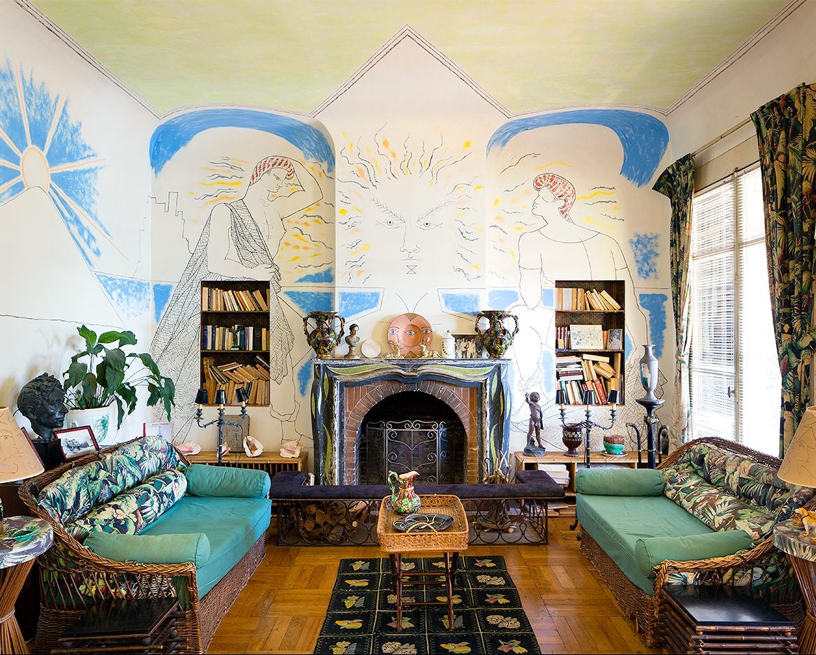 jean Cocteau villa with hand painted murals in living room