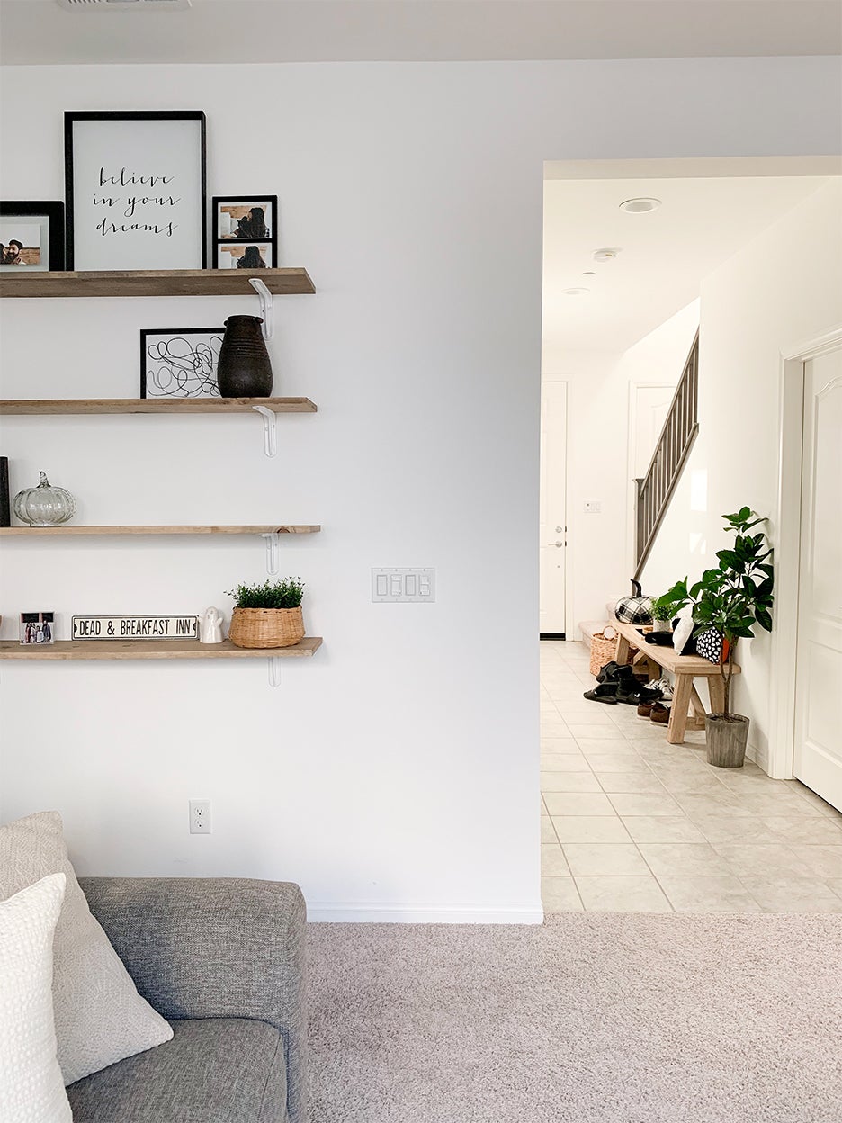 Simple white wall with shelving