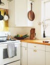 white cabinets with wood counter