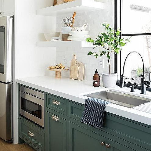 dark green and white kitchen