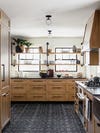 wood cabinets in a farmhouse kitchen
