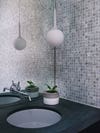 grey bathroom tiles white pendant light