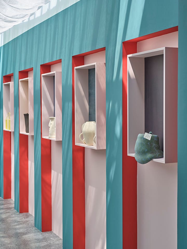 teal pink and red walls with recessed niches