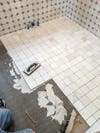 floor tile install bathroom