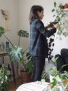 woman in room with plants