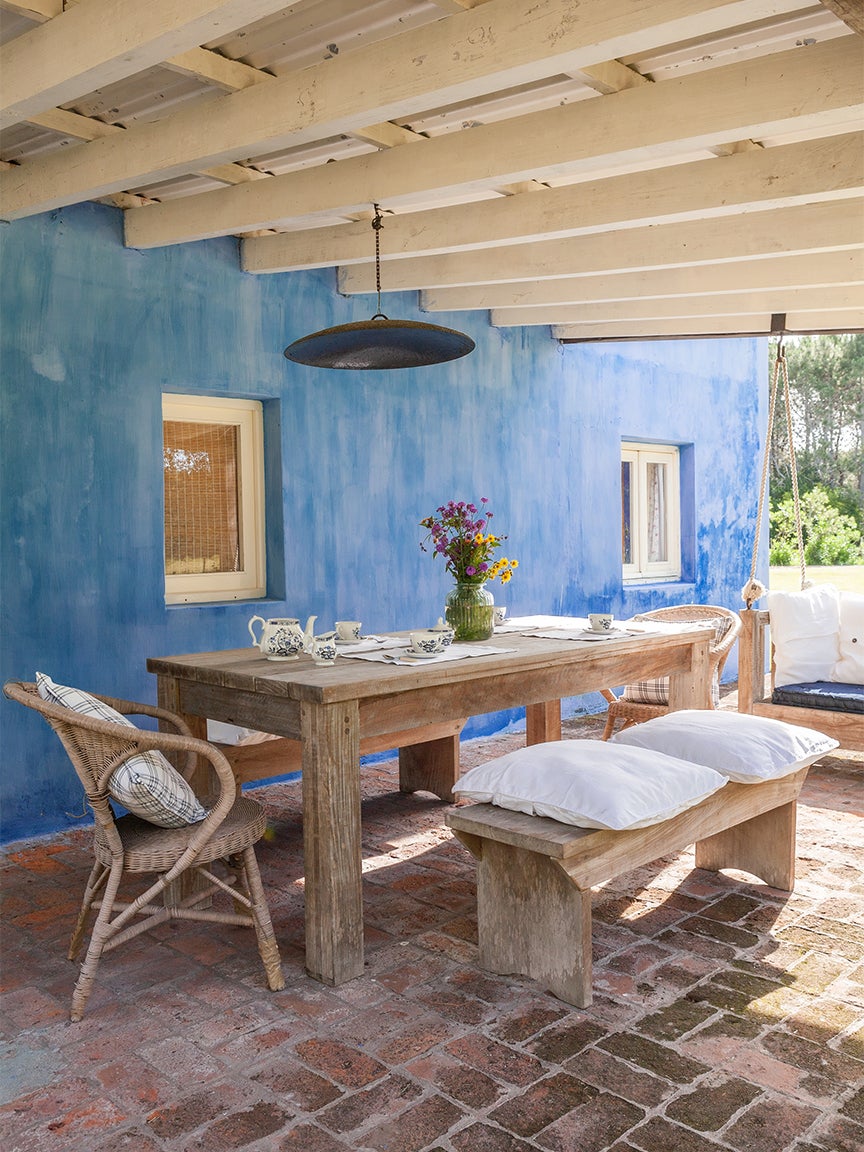light blue walls outdoor patio dining room