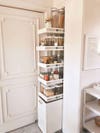 Pantry with narrow pull-out shelves