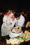 couple cutting a cake