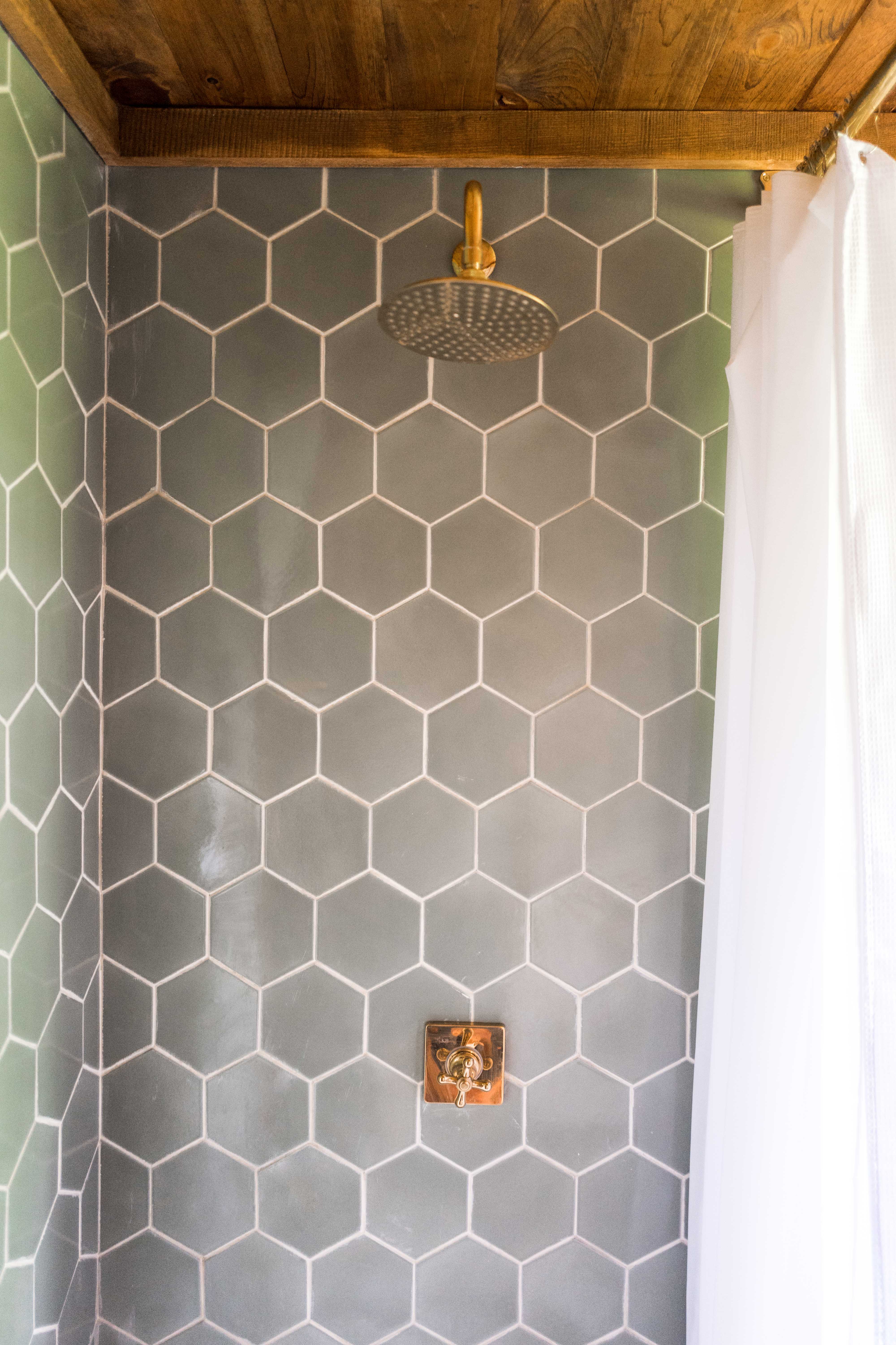 Shower with gray hex tile
