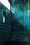emerald green tile shower nook