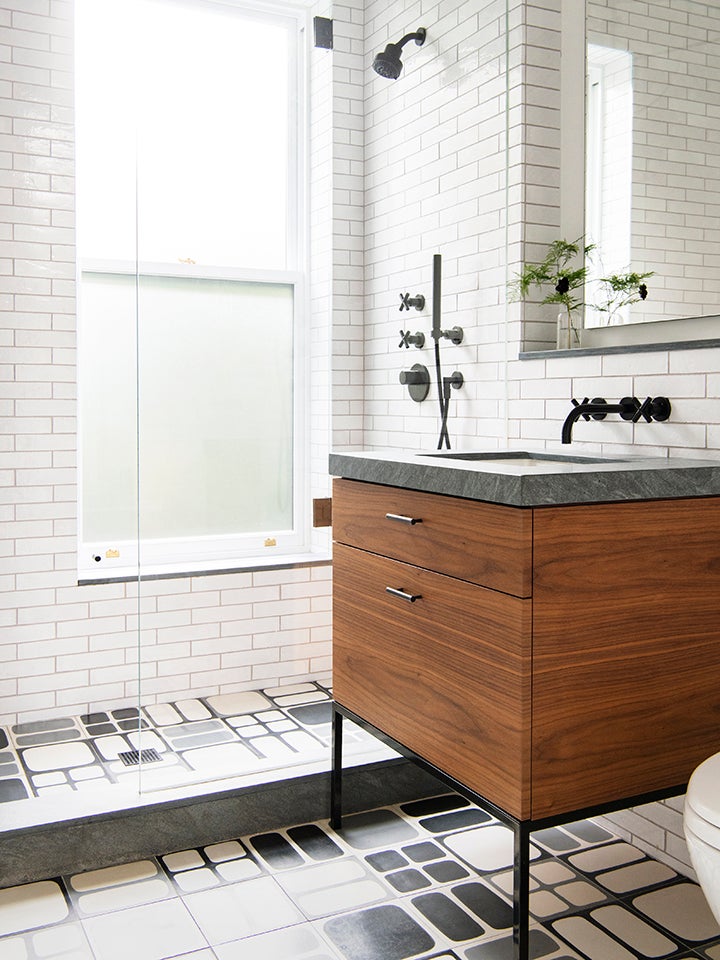 white bathroom with wood sink fixture