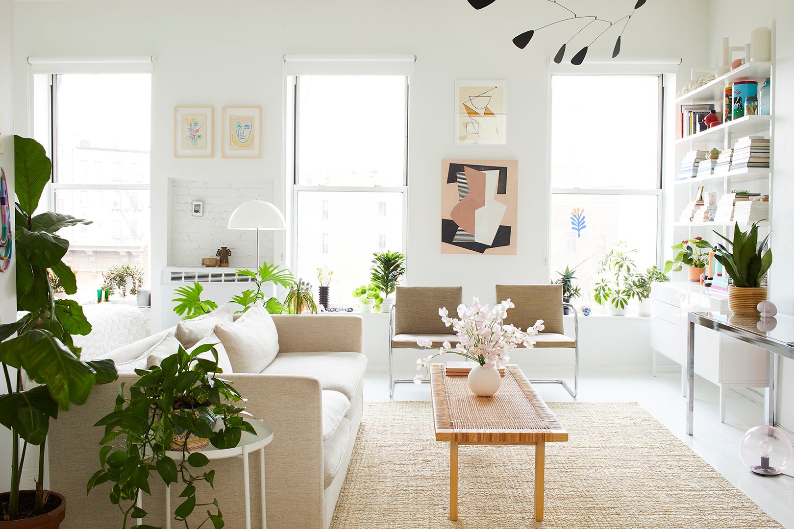 white studio apartment with neutral furniture