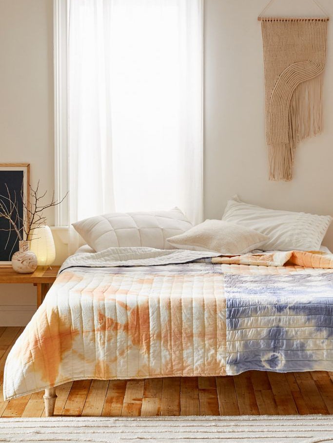 bedroom with tie dye bedspread