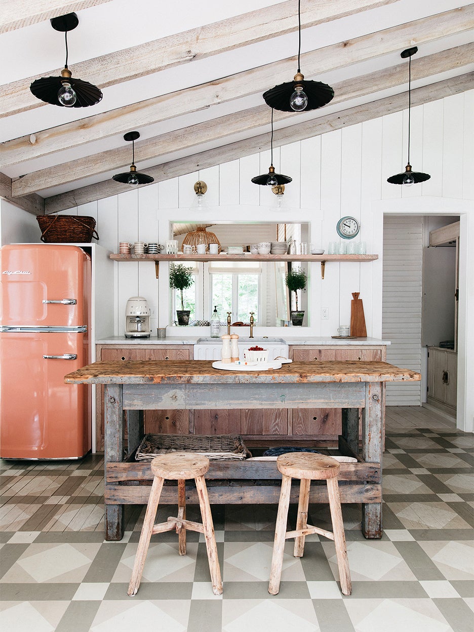 rustic kitchen wiht pink fridge
