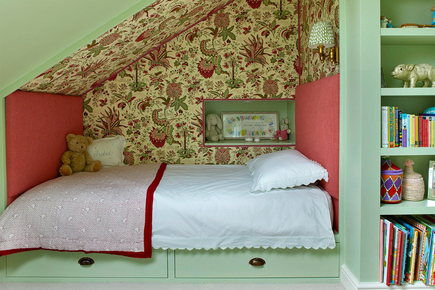 Kids built-in bed nook with floral fabric walls