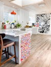 white kitchen with colorful peninsula