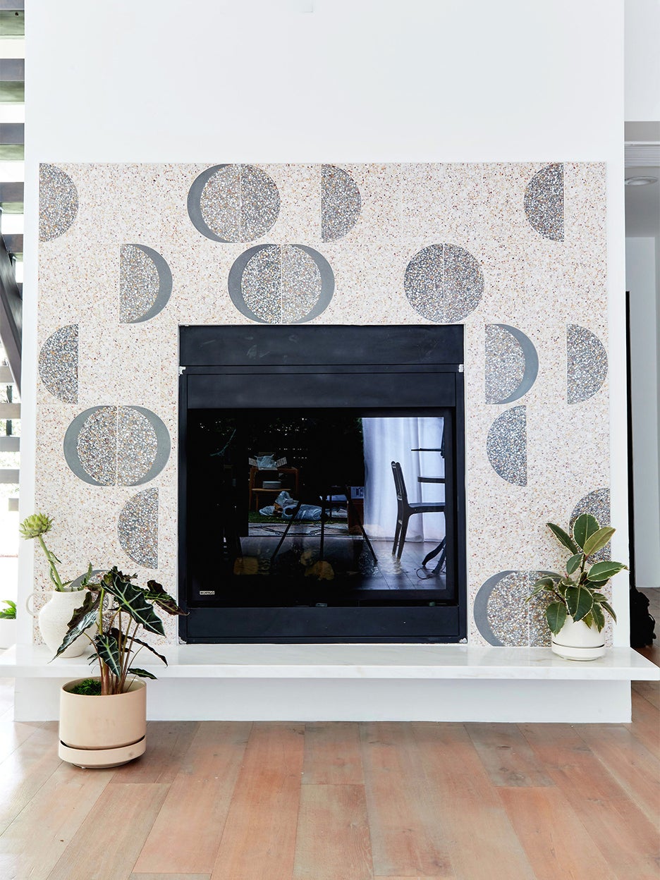 fireplace surround in half moon tile circles