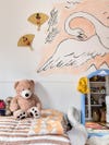 Kids room with swan mural