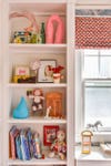 Kids room bookcase shelves with trinkets