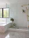 pale lavender bathroom with three different size tiles